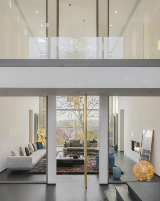 RESIDENTIAL⁠
⁠
A two-storey entrance hall offers open views throughout the building. A golden, 3-metre-high revolving door leads into the elegant living room. To give the family of nine additional privacy, a more intimate family room complements the formal living space.